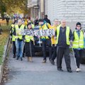 ФОТО: Общество слепых организовало поход по Таллинну, чтобы обратить внимание на проблемы слабовидящих