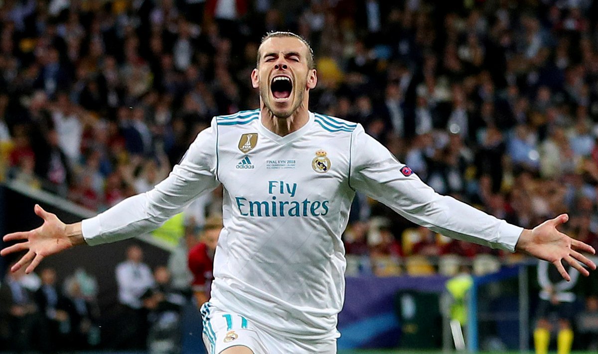 FILE PHOTO: Real Madrid's Gareth Bale celebrates scoring their second goal in a 3-1 Champions League final win over Liverpool. Bale's brace and errors by Liverpool keeper Loris Karius gave the Spanish side a third straight title in the competition.