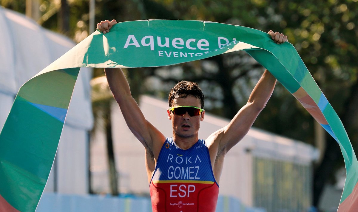Noya of Spain celebrates after winning the men's triathlon at the ITU World Olympic Qualification event on Copacabana beach in Rio de Janeiro