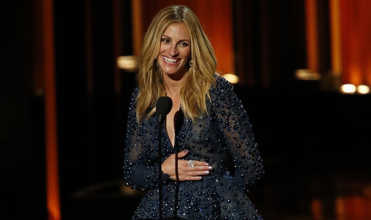 Actress Julia Roberts presents the award for Outstanding Lead Actor In A Drama Series during the 66th Primetime Emmy Awards in Los Angeles