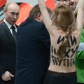 ФОТО: Полуголые активистки прорвались к Путину и Меркель в Ганновере. Президенту РФ понравилось