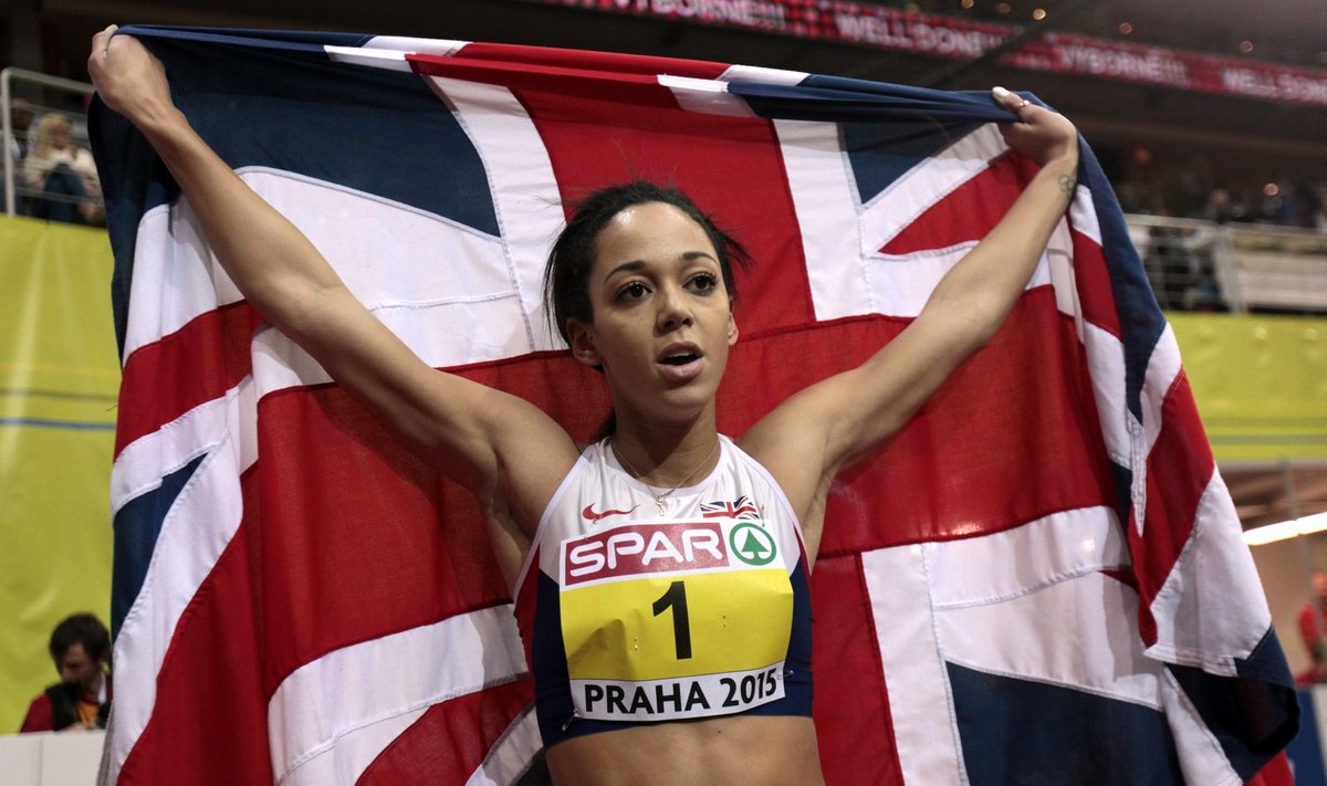 Johnson-Thompson of Britain celebrates after winning the women's penthatlon and the 800 metres event during the IAAF European Indoor Championships in Prague