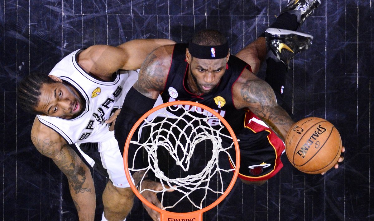 Heat's James scores on Spurs Leonard during Game 4 of the NBA Finals in San Antonio