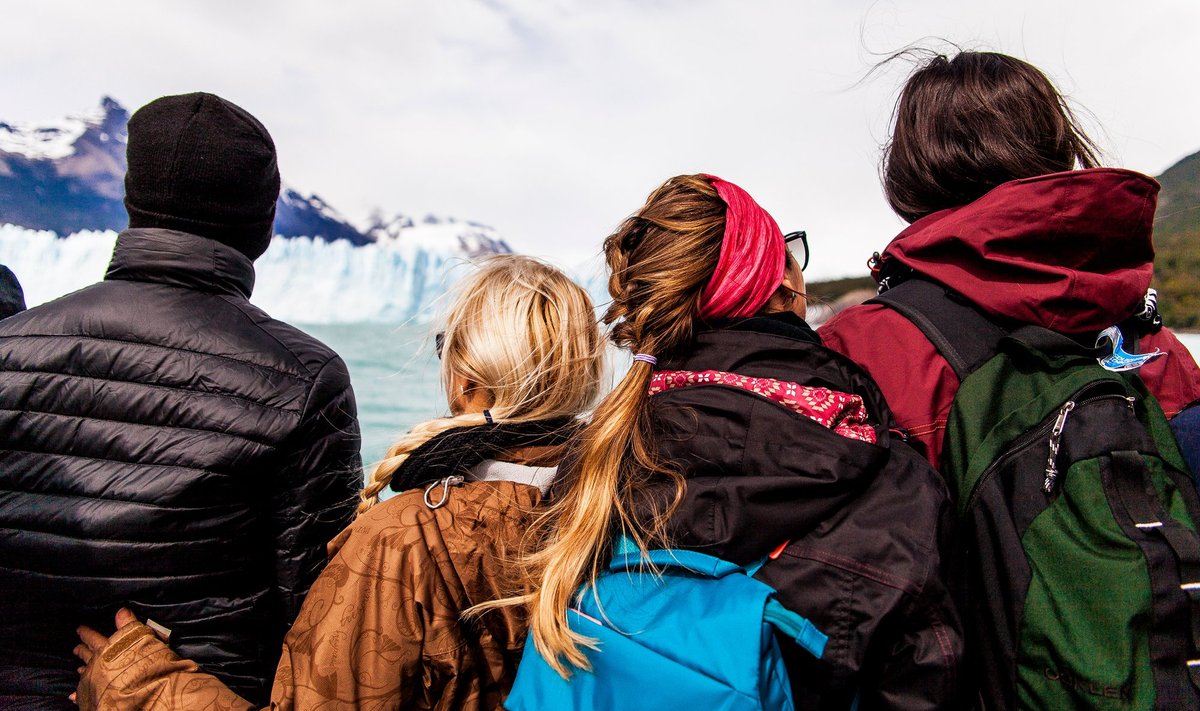 People,Watching,Icebergs,On,Winter,Clothes