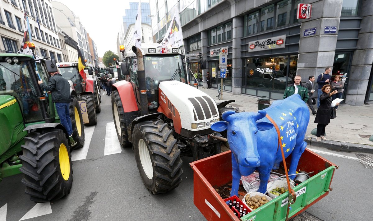 Farmers and dairy farmers from all over Europe take part in a demonstration outside an European Union farm ministers emergency meeting at the EU Council headquarters in Brussels