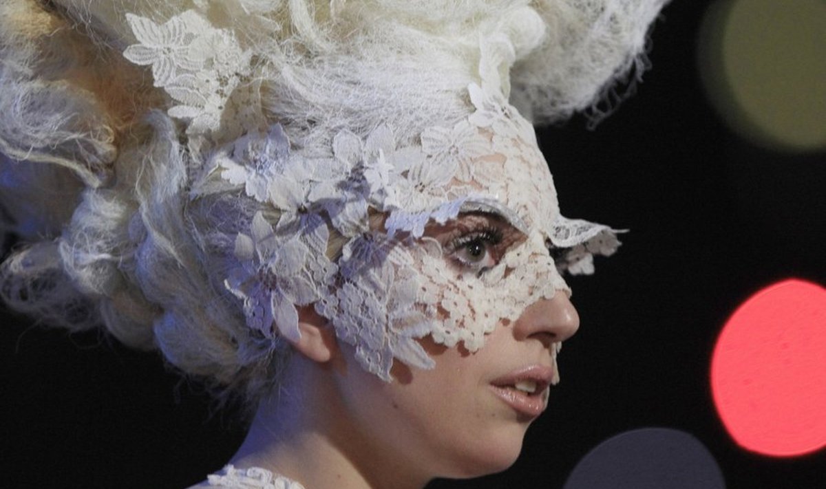 U.S. singer Lady Gaga accepts the award for best international breakthrough act at the 30th Brit Awards ceremony at Earl's Court in London, February 16, 2010. REUTERS/Suzanne Plunkett (BRITAIN - Tags: ENTERTAINMENT)