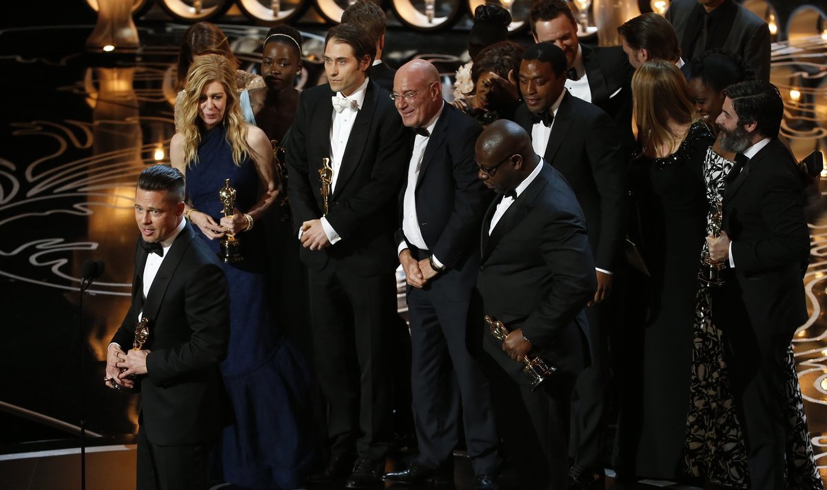 Producer Pitt talks as he and Gardner, Kliner, director McQueen and Katagas accept the Oscar for best picture for "12 Years A Slave"