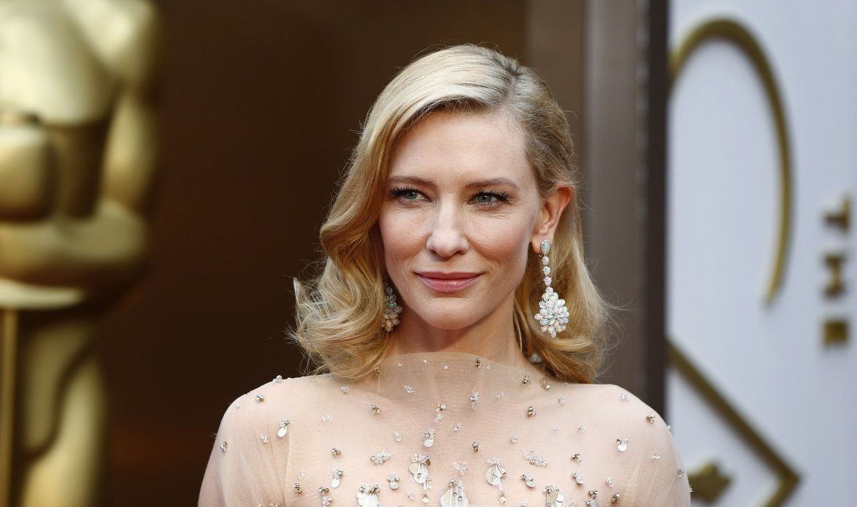 Cate Blanchett, best actress nominee for her role in "Blue Jasmine," poses as she arrives at the 86th Academy Awards in Hollywood, California