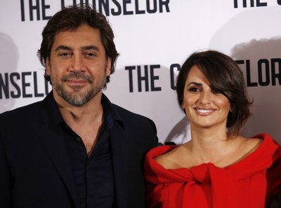 Actors Javier Bardem and Penelope Cruz pose for photographers at a photocall for the film "The Counselor" in London