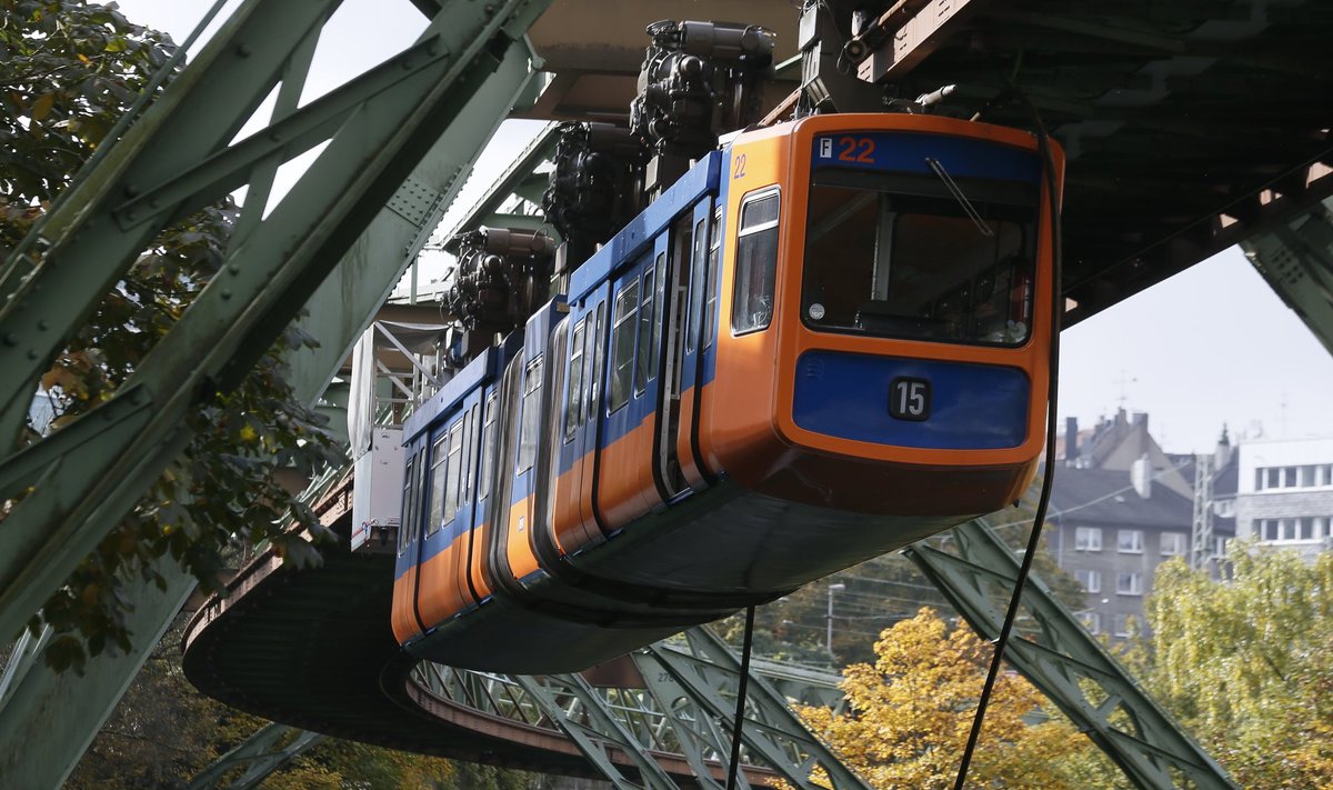 A piece of metal power line from Wuppertal Schwebebahn hangs down from a stranded carriage in Wuppertal