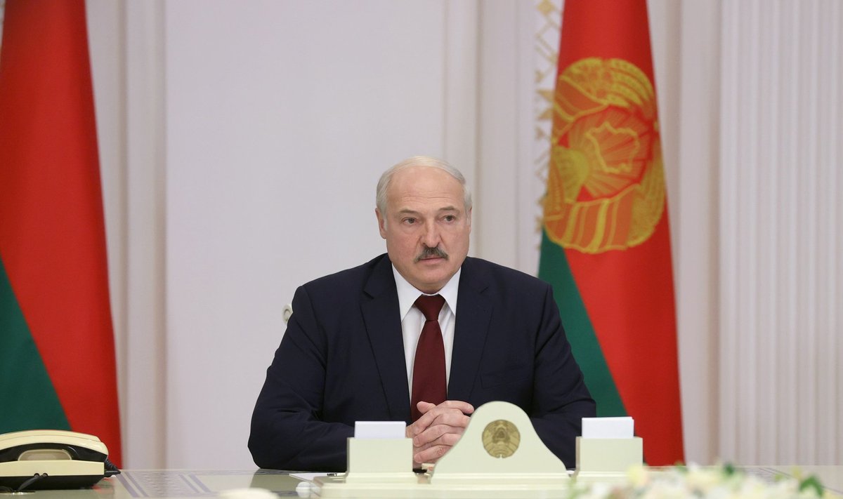 Belarusian President Lukashenko attends a meeting in Minsk