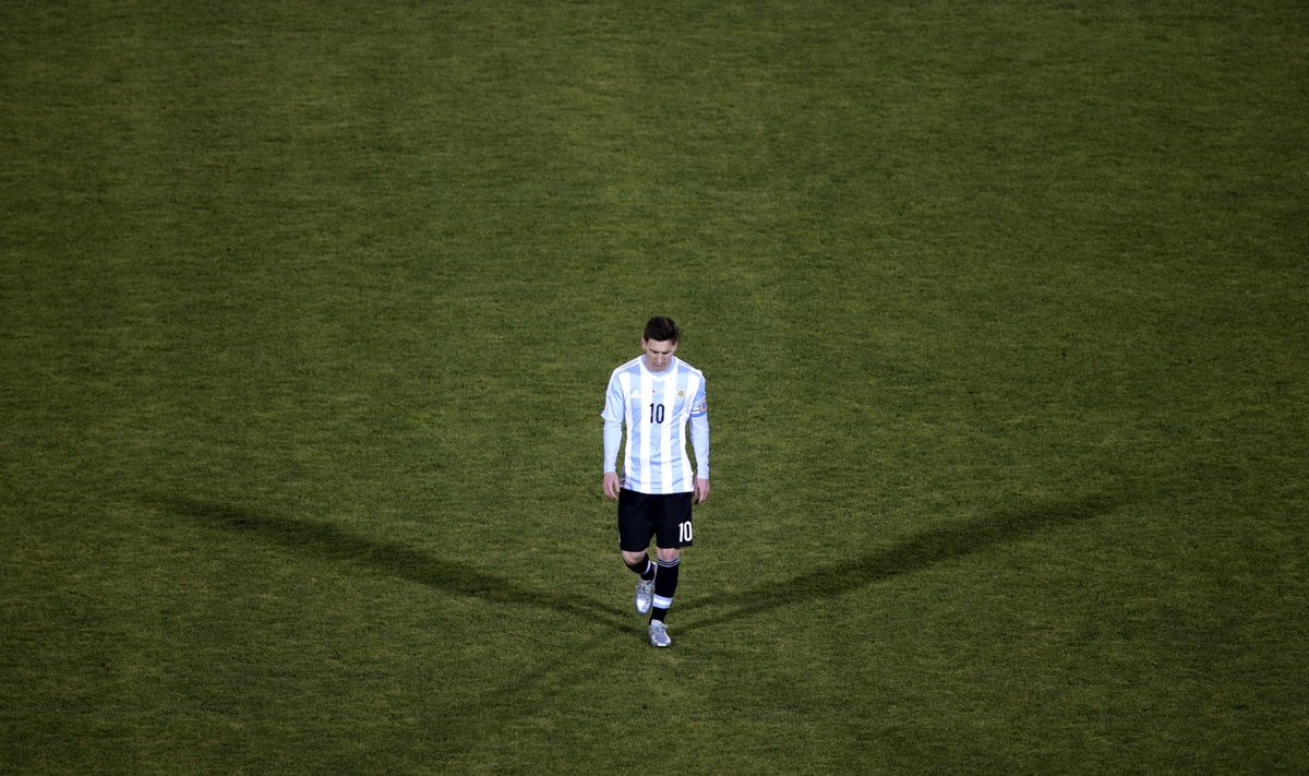 Argentina's Lionel Messi reacts after his team's loss to Chile in their Copa America 2015 final soccer match at the National Stadium in Santiago