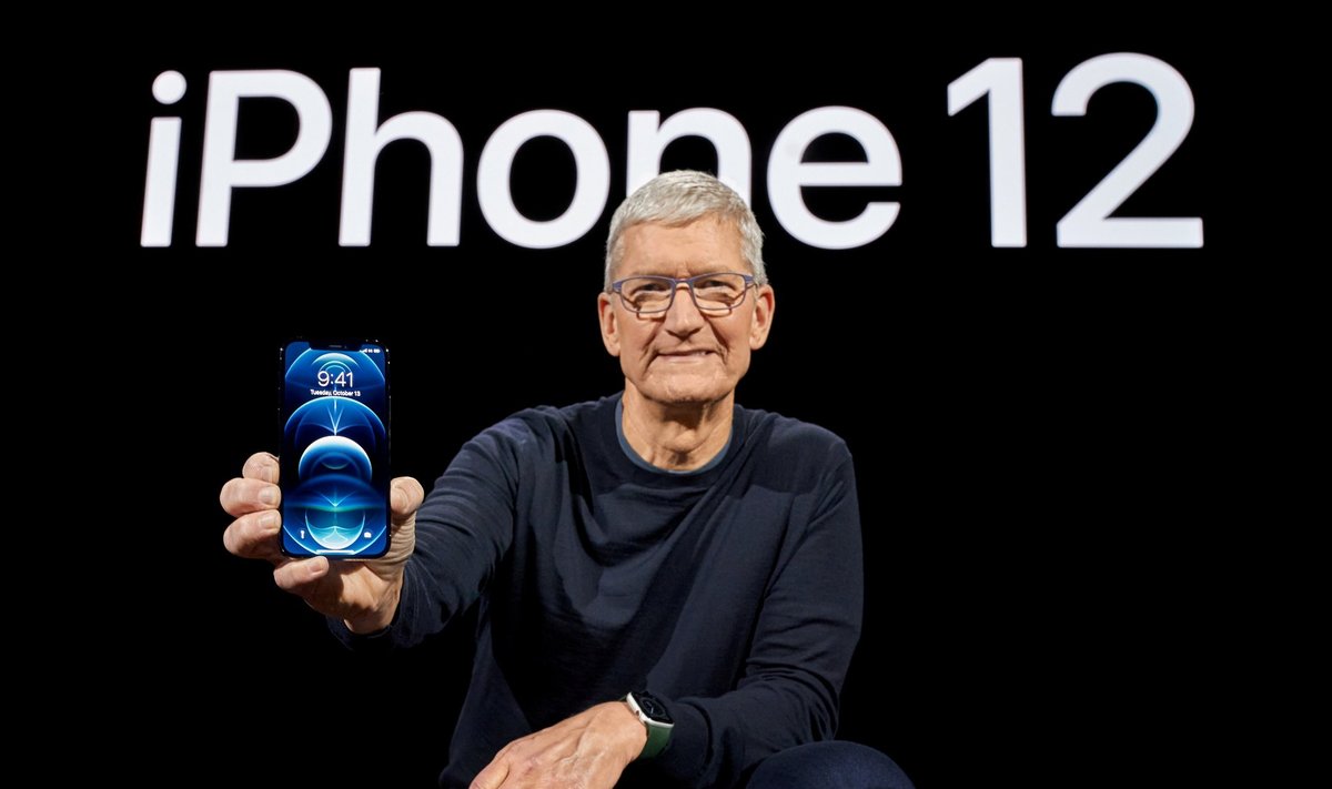 Apple CEO Tim Cook poses with the all-new iPhone 12 Pro at Apple Park in Cupertino