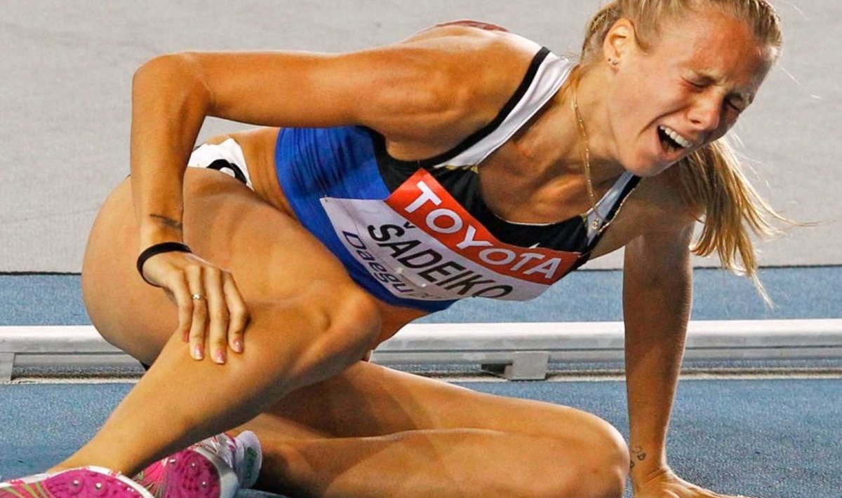 Ai, kui valus! Grimass seitsmevõistleja Grit Šadeiko näol pärast vigastuse saamist 800 meetri jooksul mullusel kergejõustiku MMil Daegus.(Scanpix / Reuters / David Gray)