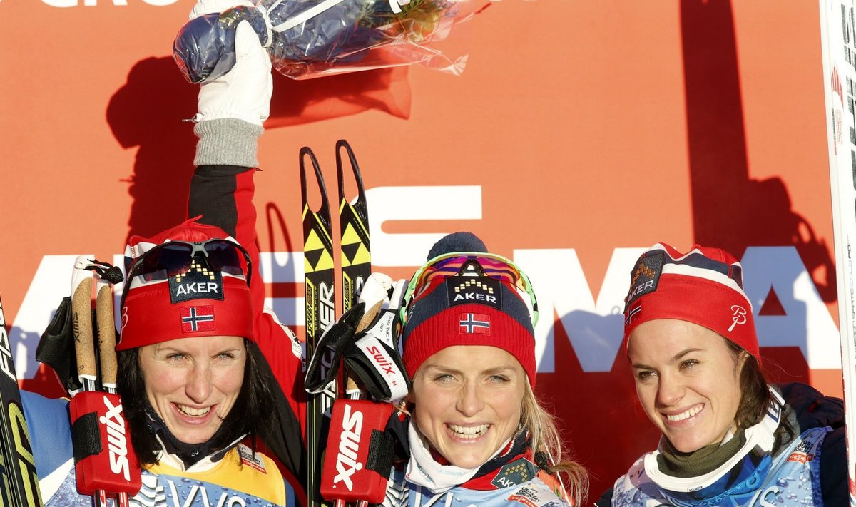 Marit Björgen, Therese Johaug ja Heidi Weng 2014. aasta detsembris Lillehammeris.