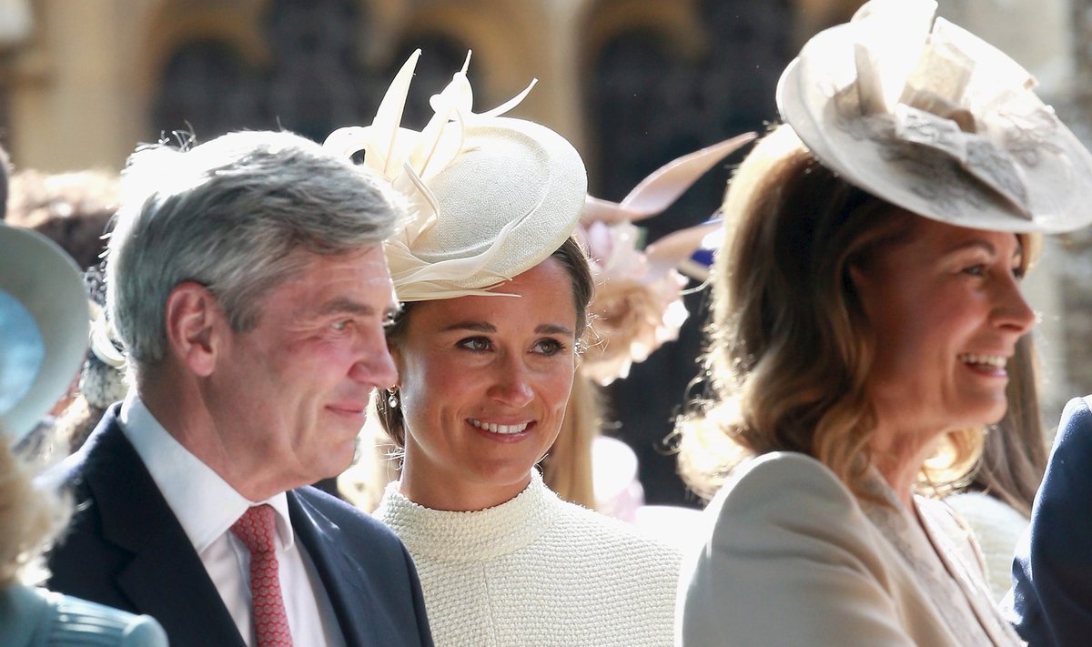 Michael Middleton, Carole Middleton and Pippa Middleton leave the Church of St Mary Magdalene on the Sandringham Estate for the Christening of Princess Charlotte of Cambridge