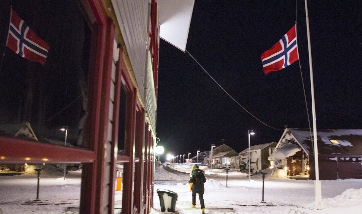 A Norwegian flag waves at half-staff after Saturday's avalanche which hit the Norwegian town of Longyearbyen, the biggest settlement on the Arctic archipelago of Svalbard