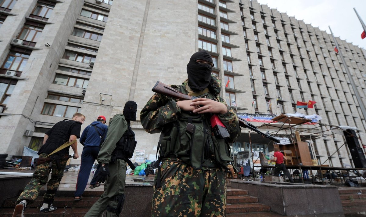 Luganskis käis juunis 2014 mässumeelsete ja valitsusvägede vahel äge lahingutegevus. 
