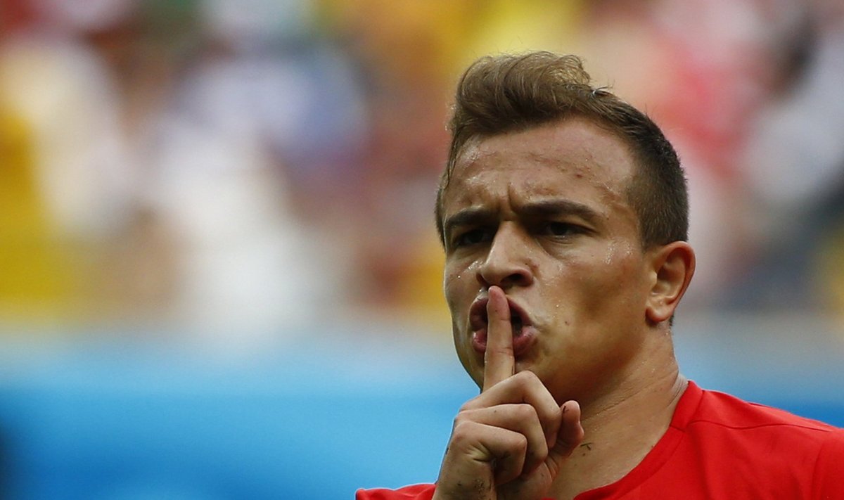 Switzerland's Xherdan Shaqiri celebrates after scoring a goal during the 2014 World Cup Group E soccer match between Honduras and Switzerland at the Amazonia arena