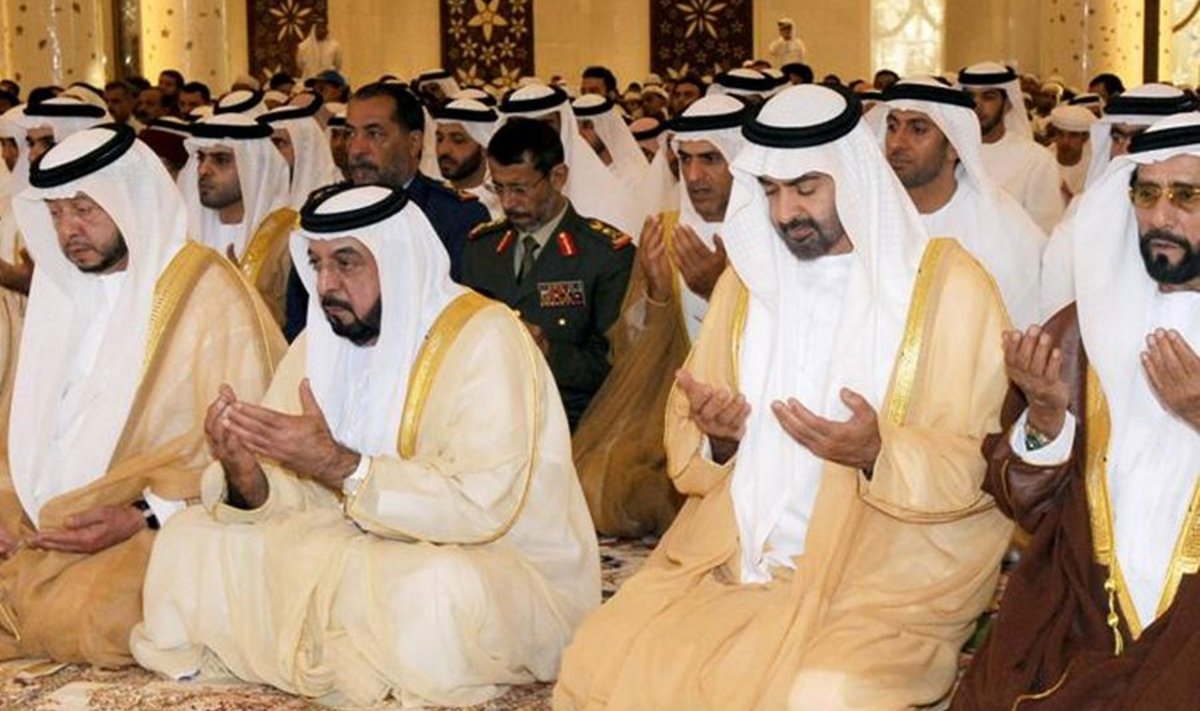 In a handout picture released by the official Emirati news agency (WAM), the United Arab Emirates' President Sheikh Khalifa bin Zayed al-Nahayan (2nd L) and Abu Dhabi's Crown Prince Mohammed bin Zayed al-Nahyan (2nd R) attend the Eid al-Fitr morning prayer at Sheikh Zayed mosque in Abu Dhabi September 20, 2009. Muslims across the world celebrated Eid al-Fitr marking the end of the holy month of      Ramadan, but authorities urged caution as large social gatherings and returning Mecca pilgrims fuelled fears of swine flu spreading.  AFP PHOTO/WAM/HO-- RESTRICTED TO EDITORIAL USE --