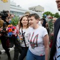 ФОТО: Самолет с Надеждой Савченко приземлился в Киеве, а с Ерофеевым и Александровым — в Москве