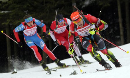 Shipulin of Russia, Mesotitsch of Austria and Slesingr of the Czech Republic compete in the men's 4x7.5 km relay during the International Biathlon Union World Championships in Nove Mesto