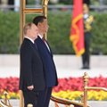 Путин приехал в Китай укреплять дружбу с Си против США. Он привез с собой почти всех высших чиновников