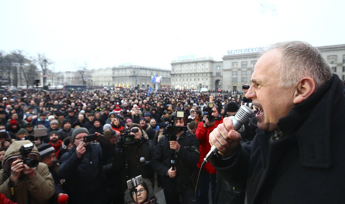 Belarussian opposition leader Statkevich attends a protest against new taxes and increased tariffs for communal services in Minsk