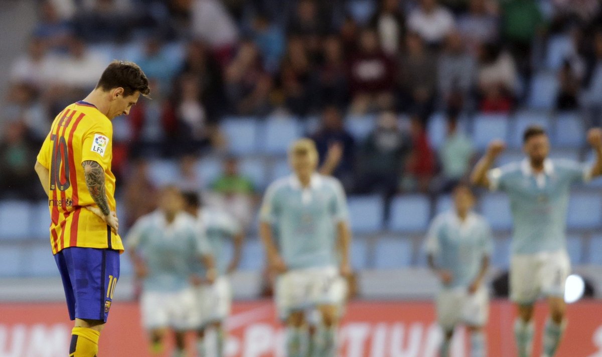 Barcelona's Messi reacts after a goal of Celta Vigo during their Spanish first division soccer match at Balaidos stadium in Vigo