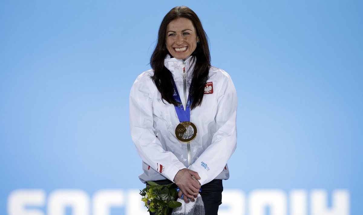 Justyna Kowalczyk 2014. aastal Sotšis poodiumi kõige kõrgemal astmel.