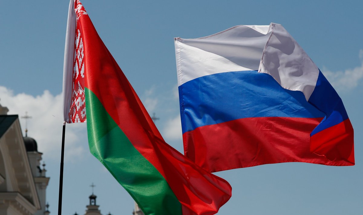 Belarusian and Russian national flags fly during "Day of multinational Russia" event in central Minsk