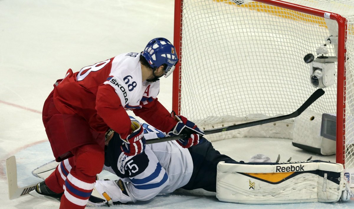 Jagr of the Czech Republic scores a goal past Finland's goaltender Rinne during their Ice Hockey World Championship quarterfinal game at the O2 arena in Prague