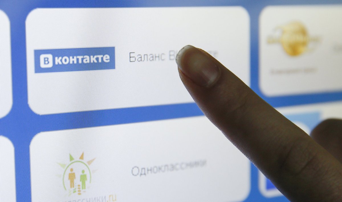 Logos of Vkontakte and Odnoklassniki social networks are seen on the screen of a payment terminal in this picture illustration