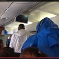 VIDEO: Lennukis ebolat maininule saabusid maandumisel vastu skafandrites mehed