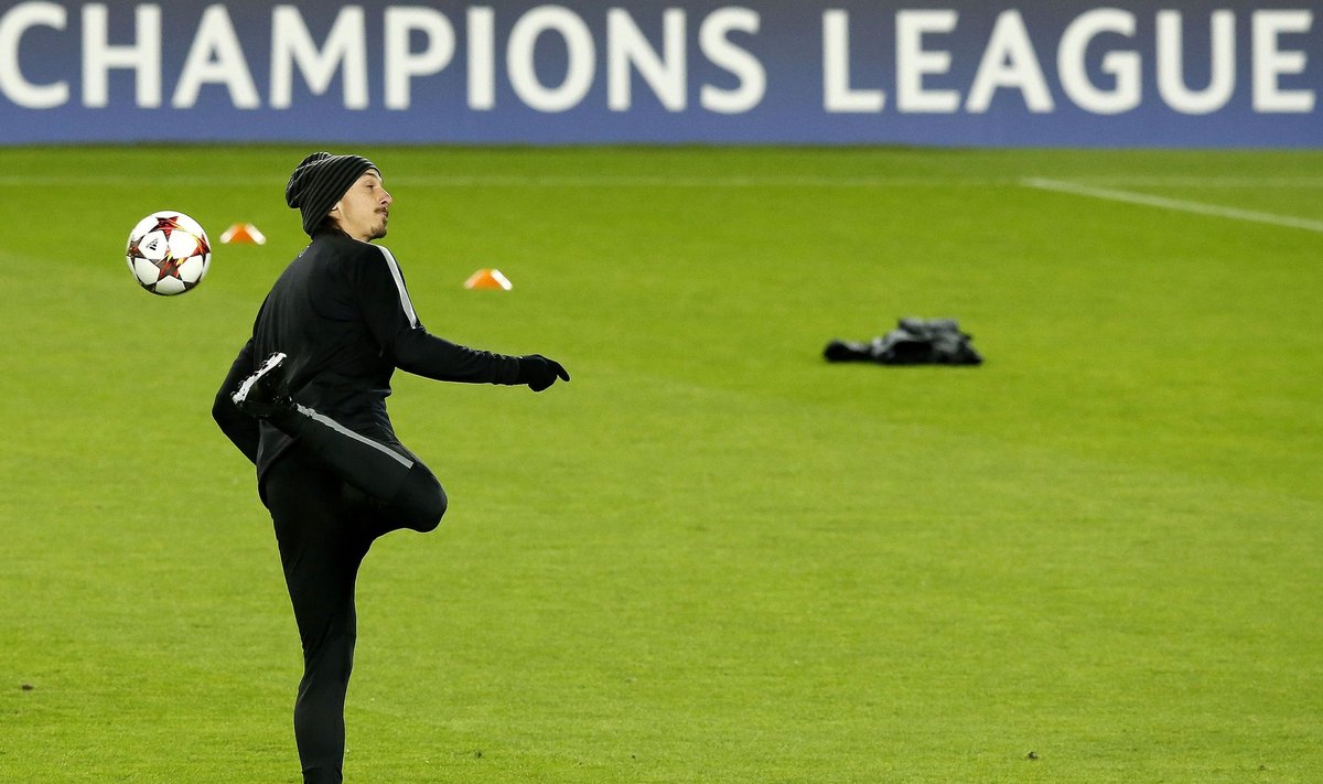 Paris Saint Germain (PSG) player Zlatan Ibrahimovic takes part in a training session ahead of their Champions League soccer match against Barcelona at Nou Camp stadium in Barcelona