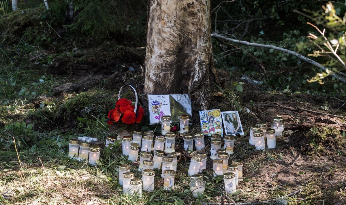 Õnnetuse ohvreid meenutavad küünlad ja fotod