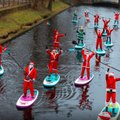 ФОТО. Необычное зрелище: Санта-Клаусы на Рижском канале