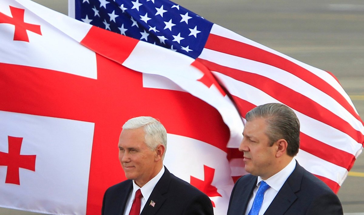U.S. Vice President Mike Pence and Georgian Prime Minister Georgy Kvirikashvili attend a welcoming ceremony at the Tbilisi International Airport