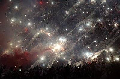 Fans of Argentina's River Plate celebrate before their Copa Sudamericana soccer match finals against Colombia's Atletico Nacional in Buenos Aires