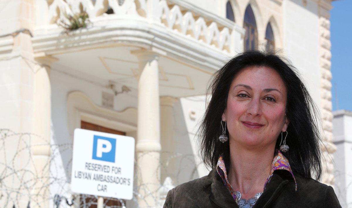 Maltese investigative journalist Daphne Caruana Galizia poses outside the Libyan Embassy in Valletta