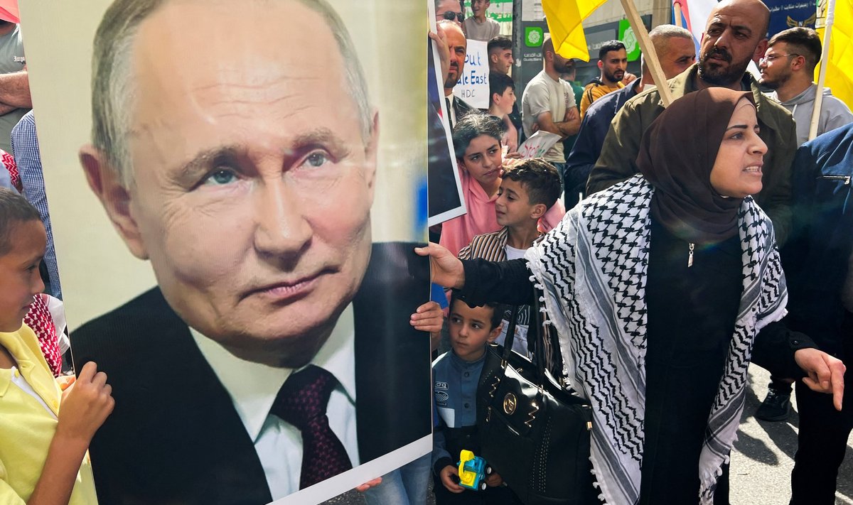 Портрет президента России Владимира Путина на протестах в поддержку жителей Сектора Газы