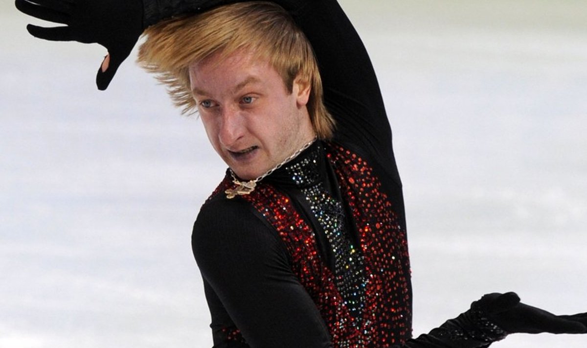 Silver medalist Russia's Evgeny Plushenko competes in the Men's figure skating free program at the Pacific Coliseum in Vancouver, during the XXI Winter Olympics on February 18, 2010. AFP PHOTO / Saeed KHAN