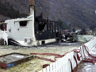 The burnt out remains of a building is pictured after a fire in Laerdal, western Norway