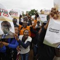 ФОТО: В Зимбабве десятки тысяч человек потребовали ухода в отставку Мугабе