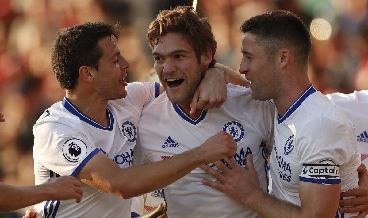 Chelsea's Marcos Alonso celebrates scoring their third goal  with Cesar Azpilicueta and Gary Cahill