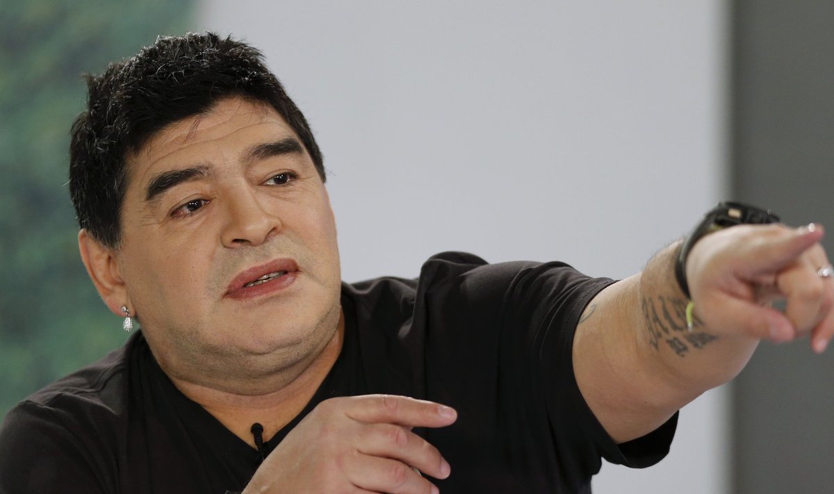 Argentina's soccer legend Diego Maradona gestures as he hosts his television show 'De Zurda' in Caracas