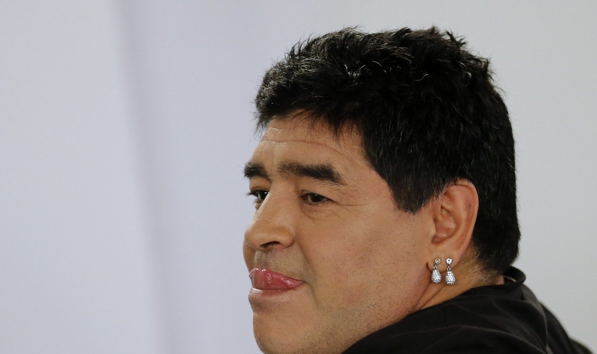 Argentina's soccer legend Diego Maradona reacts as he hosts his television show 'De Zurda' in Caracas