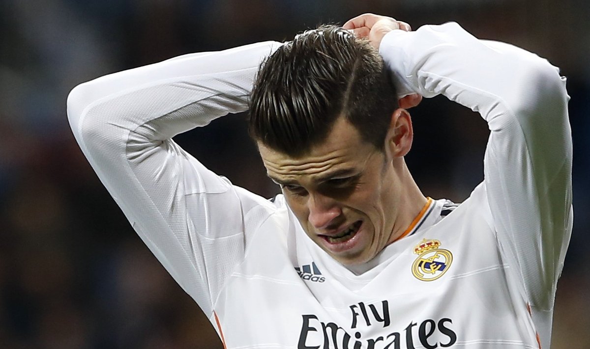 Real Madrid's Bale reacts after missing a chance to score against Galatasaray during their Champions League soccer match in Madrid