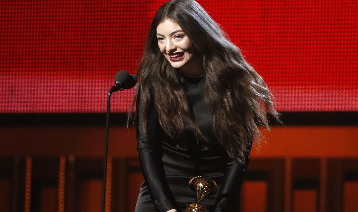 Lorde accepts the award for Best Pop Solo Performance for "Royals" at the 56th annual Grammy Awards in Los Angeles