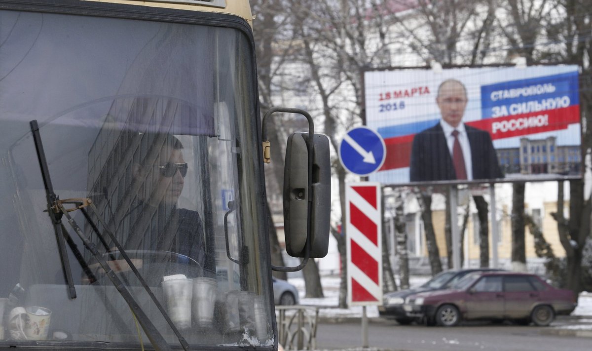 FILE PHOTO: A board, advertising the campaign of Russian President Putin ahead of the presidential election, is on display in Stavropol